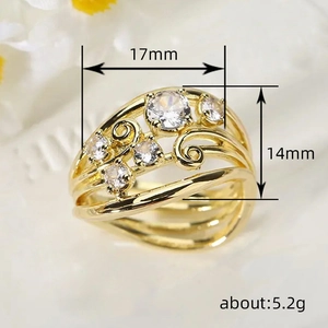Vintage style gold hollow vine ring with transparent stones and tiered leaf design