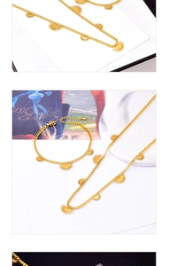 Details des goldenen fächerförmigen Sonnenanhänger Halsketten und Armband Sets