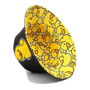 Reversible bucket hat with yellow duck print in black and yellow cotton fabric