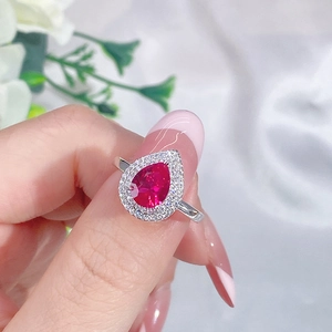 S925 sterling silver ring featuring a pear-cut ruby gemstone with sparkling diamond halo