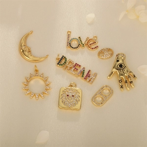 18K gold plated DIY pendants featuring sun, moon and love motifs with zircon accents
