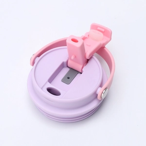 Detail of pink and purple 30oz tumbler lids with portable handle and straw opening