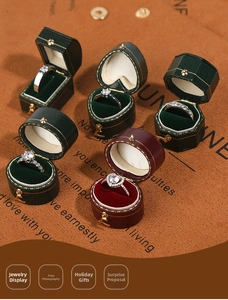 Miniature vintage ring boxes in various shapes with velvet interior and golden clasps