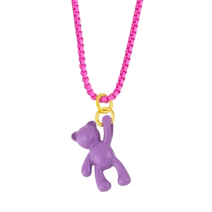Macro detail of purple bear pendant with pink chain and golden connectors on white background