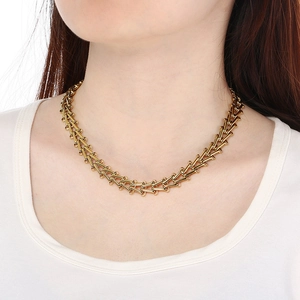 Minimalist 12mm golden stainless steel chunky chain necklace shown on a model