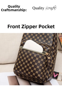Detail view of front zip pocket on vintage polka dot crossbody bag for storage