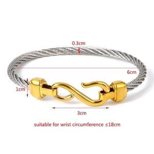 Detailed view of silver cable bracelet with gold hook clasp and sizing measurements