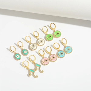 Evil eye and snake pendant earrings collection in colorful enamel and gold finish