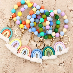 Colorful silicone bead keychain bracelet set with rainbow tassel pendants and gold metal ring