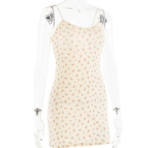 Detail of floral mini dress with lace V-neckline and adjustable spaghetti straps