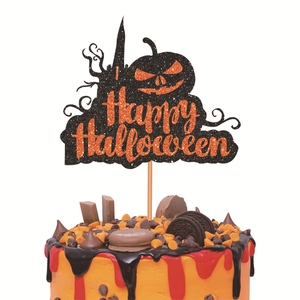 Happy Halloween cake topper with orange glitter on a chocolate orange dessert