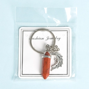 Natural red stone pillar keychain with silver crescent moon pendant and metal keyring