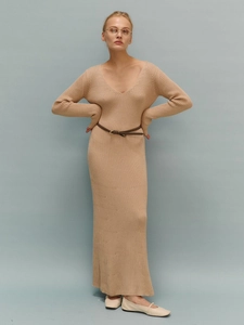 Detail of V-neck ribbed knit dress in tan with slim fit and decorative waist belt