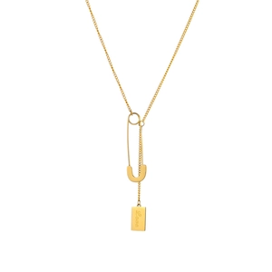Minimalist gold metal chain necklace featuring a safety pin link and Love engraved tag