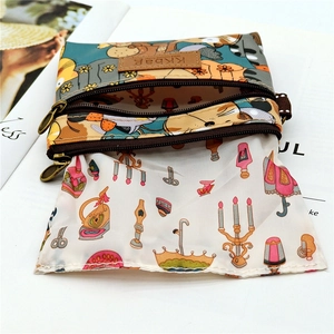 Waterproof cartoon print coin purse with three zipper layers and elegant inner lining