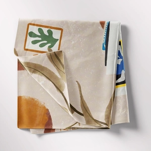 Detail of fabric texture and abstract leaf print on Bohemian decorative wall tapestry