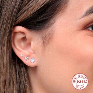 Three-piece set of S925 sterling silver square zircon stud earrings worn by a model