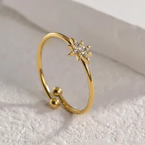 Adjustable gold plated titanium steel star ring with zircons for a minimalist look