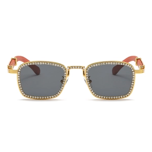 Square diamond encrusted sunglasses with gold metal frame and wood grain temples