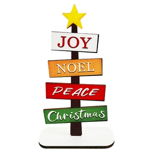 Detail of wooden Christmas tree tabletop sign with Joy Noel Peace lettering and star topper