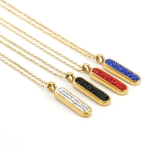 Golden stainless steel pendant necklaces set with white, black, red, and blue crystals