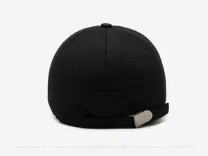 Detail view of the black wool baseball cap back with adjustable metal buckle