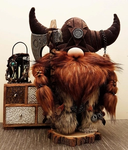 Detail view of Viking Warrior Gnome doll with horned helmet and battle axe