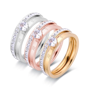 Three-color roman numeral rings with six-prong set solitaire and micro-pave diamonds