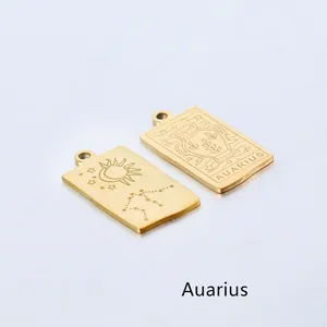 Detailed close-up of golden stainless steel Aquarius zodiac rectangular charm pendants