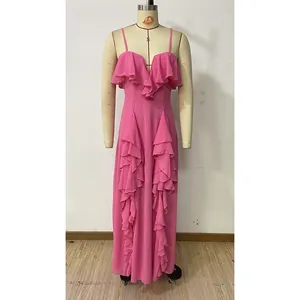 Detail of pink chiffon evening dress featuring elegant ruffles and a backless V-neckline