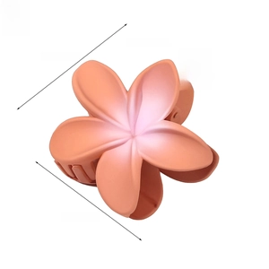 Detailed size specifications for the 8cm coral pink matte frangipani flower hair claw clip