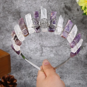 Detail of amethyst and quartz crystal crown featuring a Celtic triple moon symbol