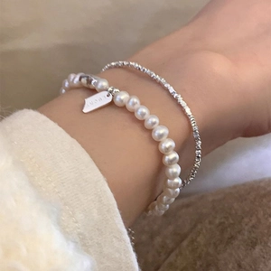 S925 sterling silver layer bracelet with freshwater pearls and a Lucky square tag