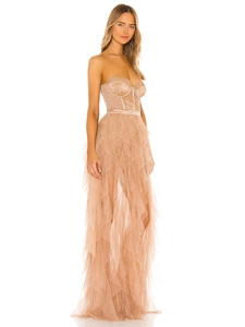 Detail of champagne corset dress with intricate lace floral embroidery and layered tulle