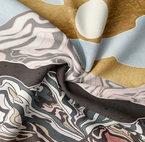 Close-up of abstract mountain landscape tapestry fabric with flowing sand textures
