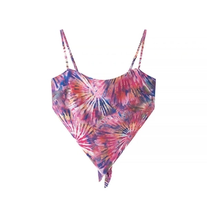 Detail of handkerchief hem crop top featuring vibrant pink and purple tie-dye print