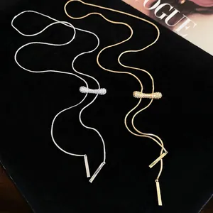 Collier lariat plaqué or 18k avec curseur réglable en zircone et chaîne serpent élégante