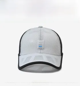 Detail of grey mesh baseball cap featuring a black SPORT FASHION MADE patch and trim