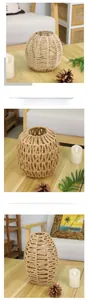 Detail of handcrafted rattan pendant light shade showing natural fiber weaving