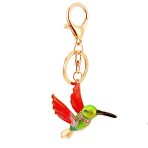 Creative hummingbird keychain featuring green body, red wings, and crystal rhinestones