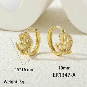 Detail view of gold hoop earrings with zircon animal charms and size specifications