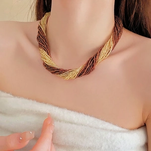 French vintage multi-layered twisted bead choker necklace in gold and brown tones
