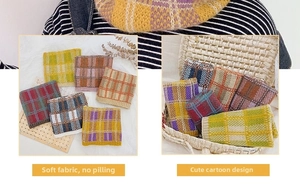 Detail of soft checkered knit neck warmer with ribbed edges in various vibrant colors