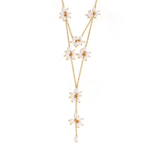Elegant 18K gold-plated Y-necklace featuring multilayered white pearl flower tassels