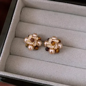 Vintage gold plated pearl flower earrings with zircon and tiger eye beads in a box
