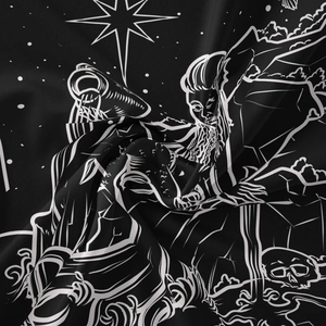 Close-up of bohemian tarot print fabric showing soft folds and detailed line art
