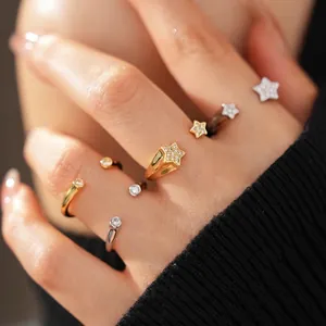 18k gold plated adjustable ring with star and circle cubic zirconia on model hand