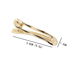 Minimalist gold metal geometric hair clip with sleek irregular hollow rectangular design