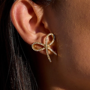 Classic 18K gold plated stainless steel bow earrings with sparkling white diamonds