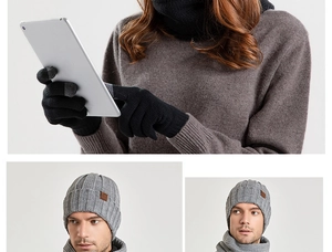 Detailed view of winter knitted set featuring touch-screen gloves and a ribbed beanie hat